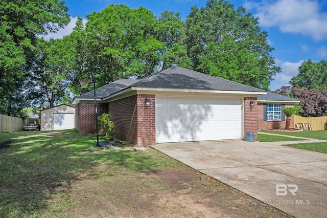 view of side of home with brick siding, driveway, a garage, and a shingled roof