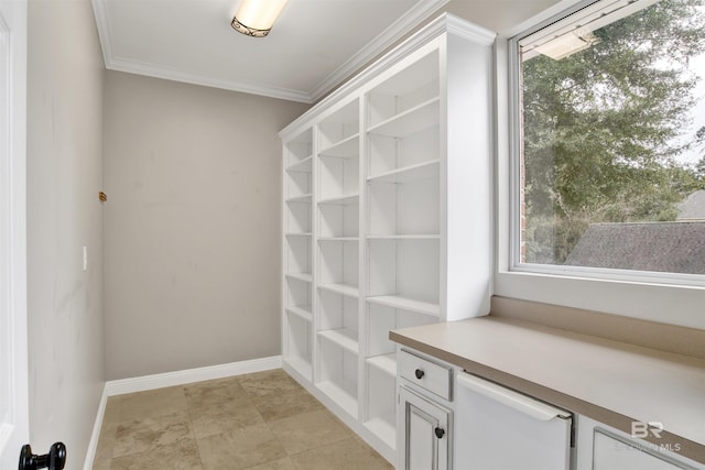 mudroom featuring crown molding