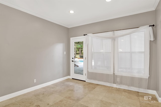 unfurnished room with ornamental molding