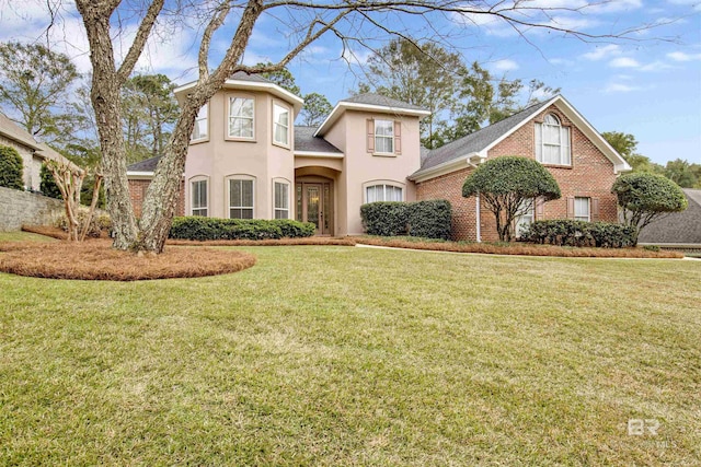 view of front facade with a front yard