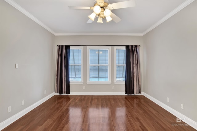 empty room featuring crown molding, ceiling fan, and dark wood-type flooring