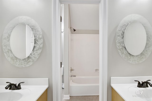 bathroom featuring vanity and tub / shower combination