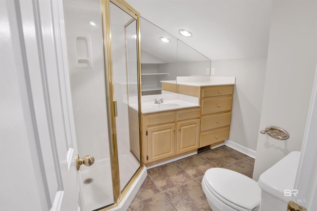 bathroom featuring toilet, an enclosed shower, and vanity