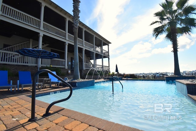 pool featuring a patio
