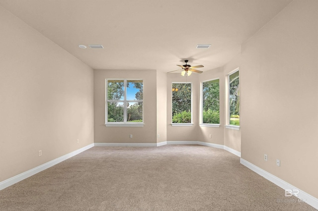 36 Lagoon Dr, Gulf Shores, AL 36542 - carpeted spare room featuring visible vents, baseboards, and ceiling fan
