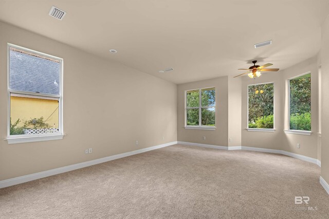 36 Lagoon Dr, Gulf Shores, AL 36542 - empty room featuring carpet, visible vents, and a ceiling fan