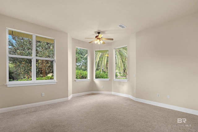 36 Lagoon Dr, Gulf Shores, AL 36542 - carpeted empty room featuring visible vents, baseboards, and a ceiling fan