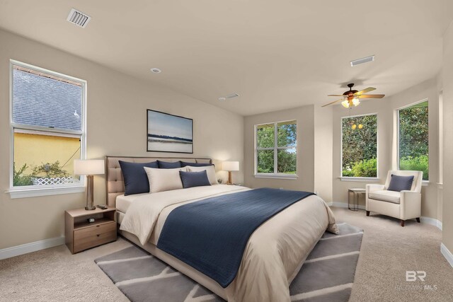 36 Lagoon Dr, Gulf Shores, AL 36542 - bedroom with visible vents, baseboards, and light colored carpet
