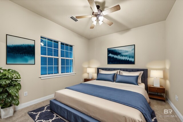 36 Lagoon Dr, Gulf Shores, AL 36542 - carpeted bedroom featuring visible vents, baseboards, and ceiling fan