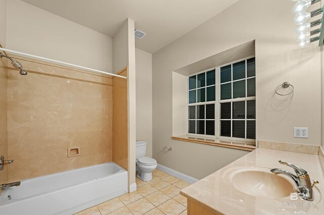 36 Lagoon Dr, Gulf Shores, AL 36542 - bathroom with vanity, baseboards, tile patterned floors, toilet, and shower / bathtub combination