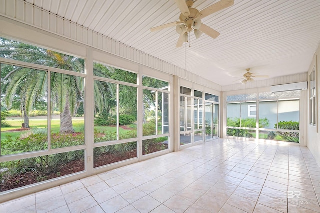 unfurnished sunroom featuring ceiling fan and a wall unit AC