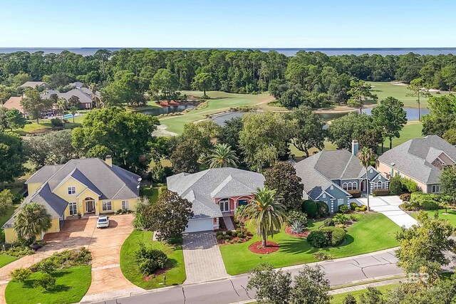 36 Lagoon Dr, Gulf Shores, AL 36542 - drone / aerial view with golf course view, a residential view, and a water view