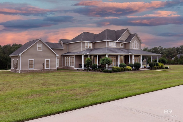 farmhouse with a lawn and a porch