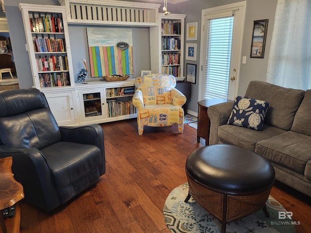 2200 W 2nd St Unit B-106, Gulf Shores, AL 36542 - living area featuring dark wood-type flooring
