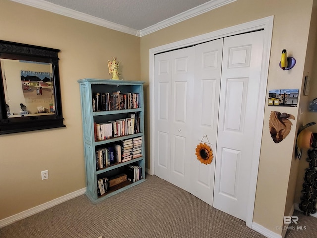 2200 W 2nd St Unit B-106, Gulf Shores, AL 36542 - miscellaneous room featuring carpet floors, ornamental molding, and baseboards