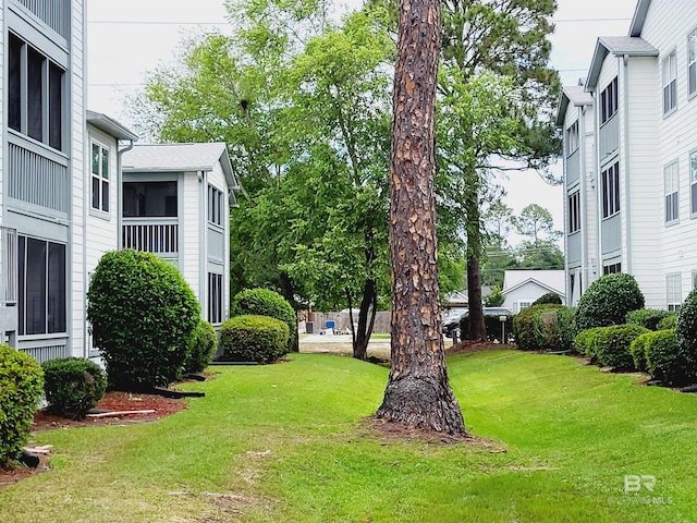 2200 W 2nd St Unit B-106, Gulf Shores, AL 36542 - view of grassy yard