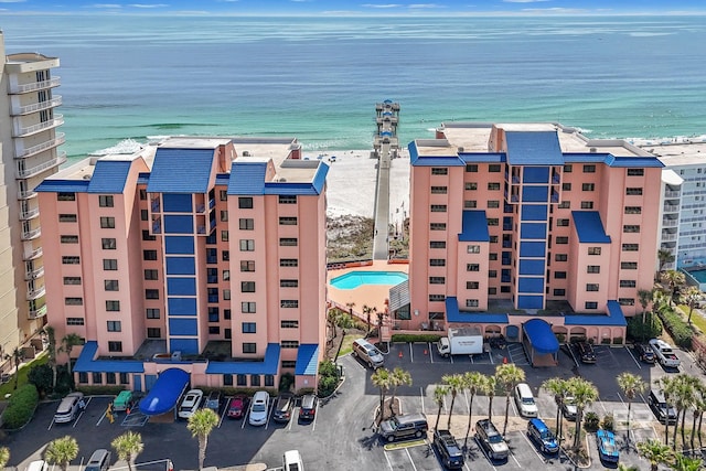 aerial view with a view of the beach and a water view