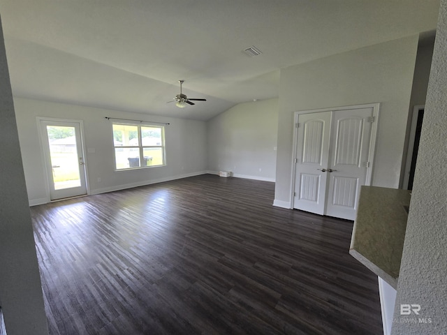 23035 Ridgewood Dr, Robertsdale, AL 36567 - unfurnished living room with a ceiling fan, lofted ceiling, and dark wood-type flooring