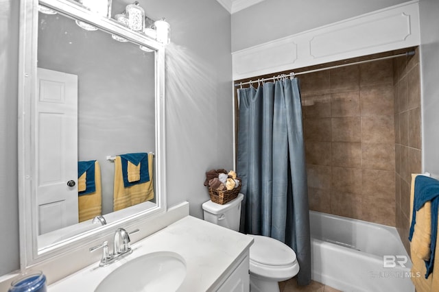 bathroom featuring toilet, shower / bath combination with curtain, ornamental molding, and vanity
