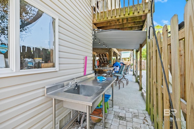 view of patio / terrace with fence