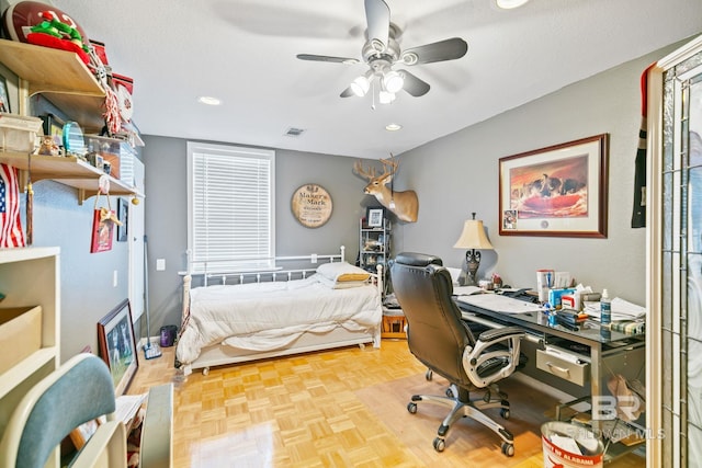 bedroom featuring parquet floors and ceiling fan