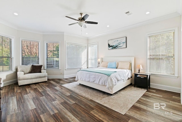 bedroom featuring ceiling fan, dark wood-type flooring, and multiple windows