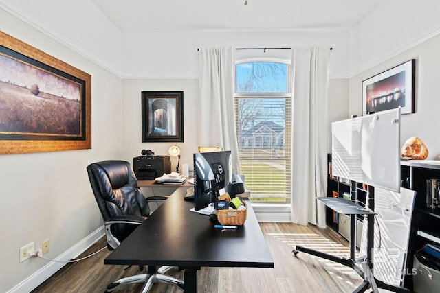 office space with wood-type flooring