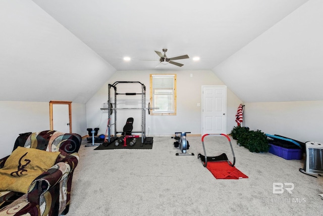 exercise room featuring ceiling fan, lofted ceiling, and carpet floors