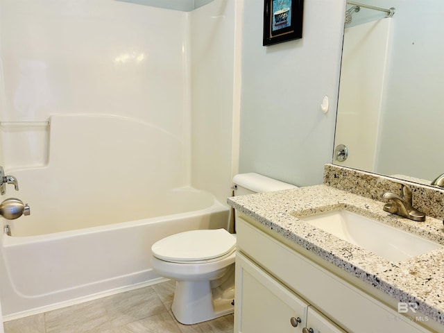 full bathroom featuring vanity, washtub / shower combination, and toilet