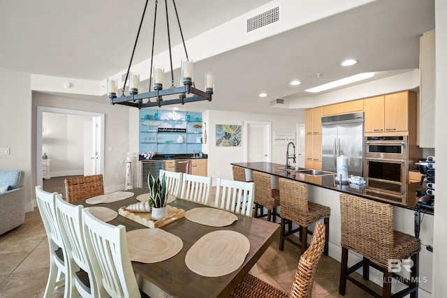 28107 Perdido Beach Blvd Unit D 503, Orange Beach, AL 36561 - dining room with light tile patterned floors, visible vents, baseboards, recessed lighting, and wine cooler