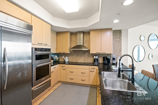 28107 Perdido Beach Blvd Unit D 503, Orange Beach, AL 36561 - kitchen with light brown cabinets, a sink, appliances with stainless steel finishes, a warming drawer, and wall chimney exhaust hood