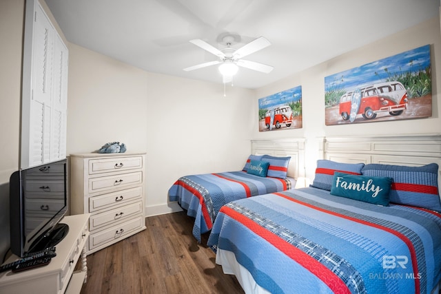 28107 Perdido Beach Blvd Unit D 503, Orange Beach, AL 36561 - bedroom with dark wood finished floors and ceiling fan