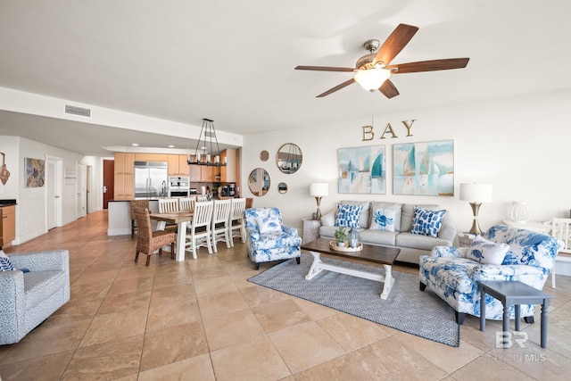 28107 Perdido Beach Blvd Unit D 503, Orange Beach, AL 36561 - living room with light tile patterned flooring, visible vents, and ceiling fan