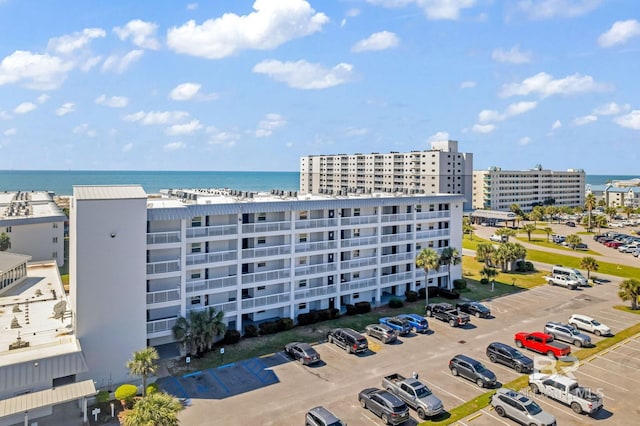 view of building exterior with a water view