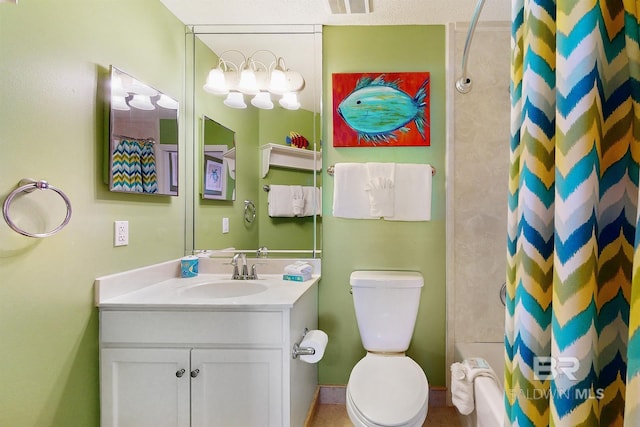 bathroom featuring visible vents, toilet, and vanity