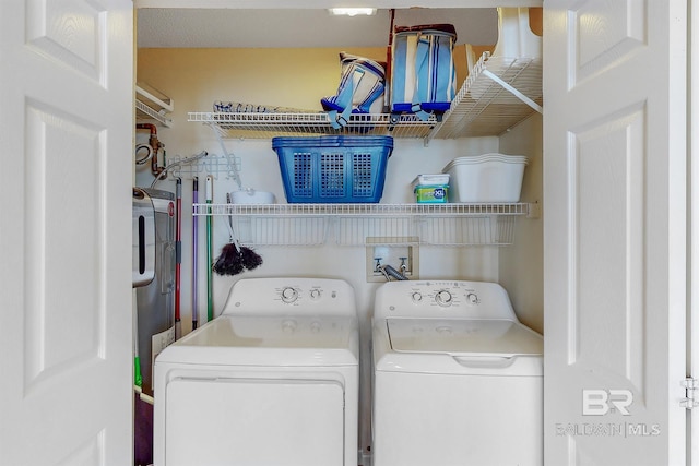 laundry room with laundry area and washer and clothes dryer