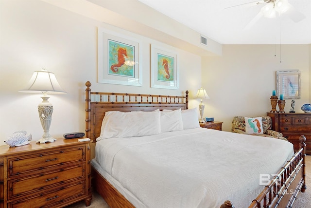 bedroom with visible vents, carpet flooring, and ceiling fan