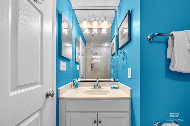 25250 Perdido Beach Blvd Unit 904E, Orange Beach, AL 36561 - bathroom featuring walk in shower, visible vents, and vanity