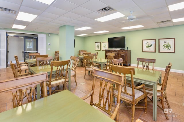 25250 Perdido Beach Blvd Unit 904E, Orange Beach, AL 36561 - dining space featuring ceiling fan, a drop ceiling, and visible vents