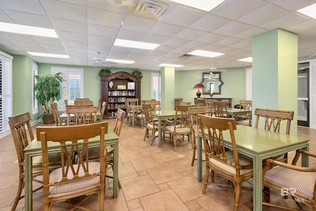 25250 Perdido Beach Blvd Unit 904E, Orange Beach, AL 36561 - dining area featuring visible vents and a drop ceiling
