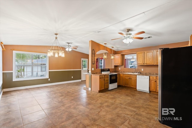 kitchen featuring kitchen peninsula, white dishwasher, electric range, decorative light fixtures, and stainless steel refrigerator