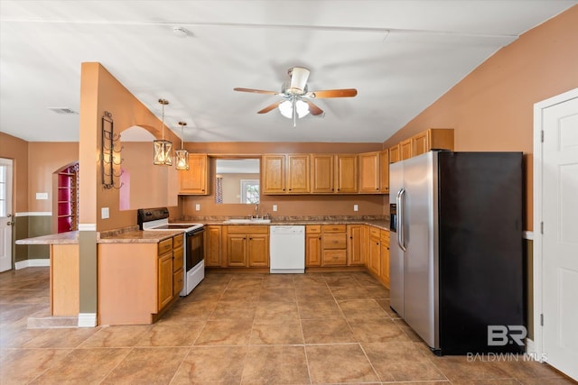 kitchen with light stone countertops, ceiling fan, sink, decorative light fixtures, and white appliances