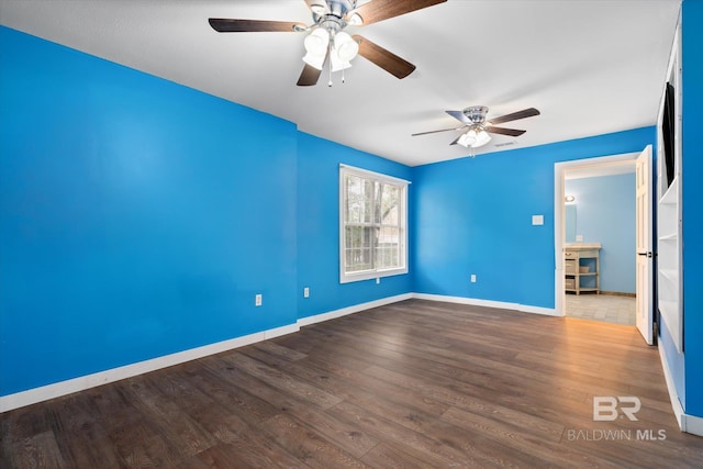 empty room with wood-type flooring and ceiling fan