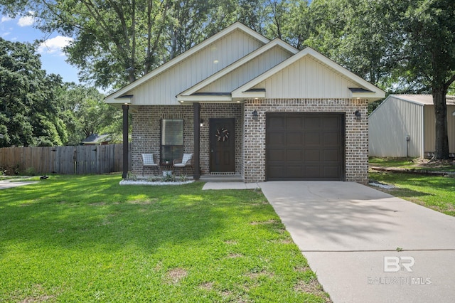 view of front of property featuring brick siding, a garage, and driveway