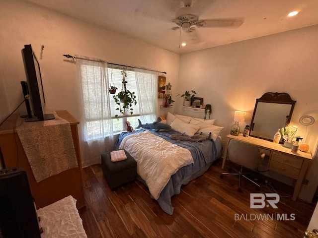 bedroom featuring hardwood / wood-style floors, recessed lighting, and a ceiling fan