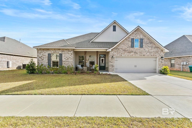 craftsman-style home with a garage, a front yard, and central air condition unit