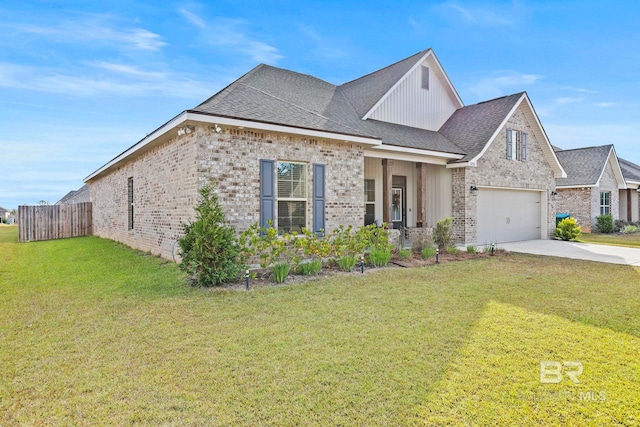 view of front facade featuring a front lawn and a garage