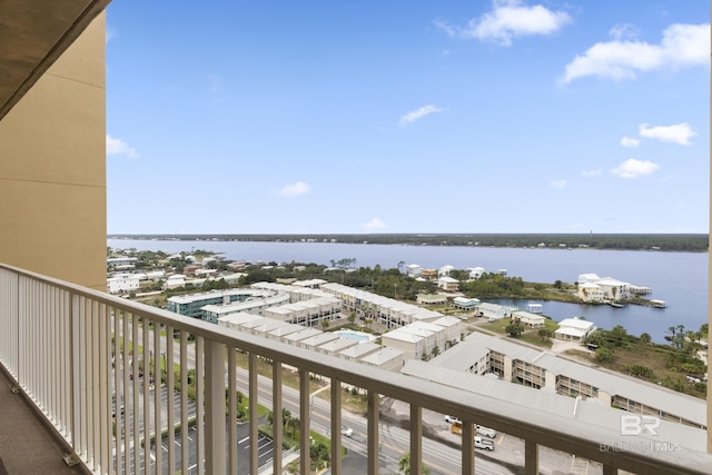 balcony featuring a water view