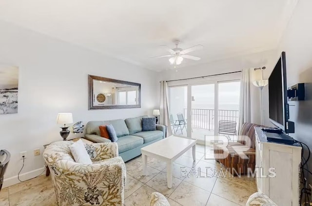 401 E Beach Blvd Unit 1804, Gulf Shores, AL 36542 - living area featuring ceiling fan and baseboards