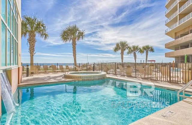 401 E Beach Blvd Unit 1804, Gulf Shores, AL 36542 - community pool with a community hot tub